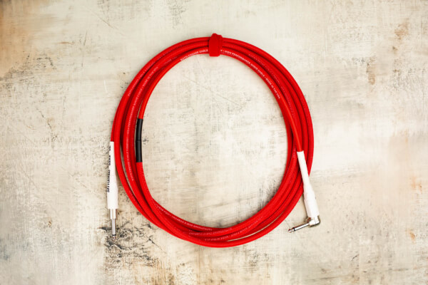 15' Snake Head in Bullseye Red with Neutrik Right Angle Nickel (connected to instrument) to Neutrik Straight Nickel with White Tubes