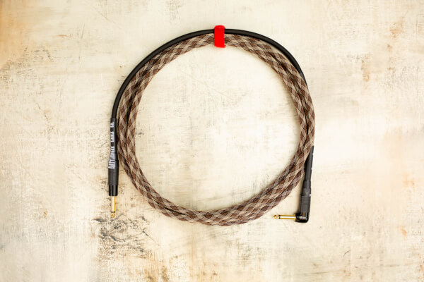 15' Snake Head in Snake Weave with Neutrik Straight Gold (connected to instrument) to Neutrik Right Angle Gold 